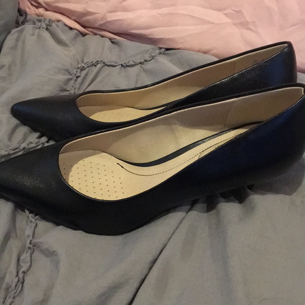 Black pointed high heels